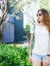 asian-hipster-girl-long-brown-hair-white-blank-t-shirt-is-standing-middle-street