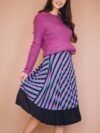beautiful-woman-purple-sweater-skirt